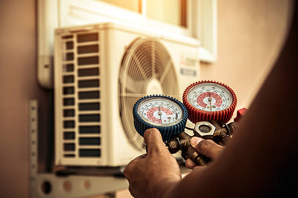 Professional Air Conditioning Service technician working in Trafalgar, IN